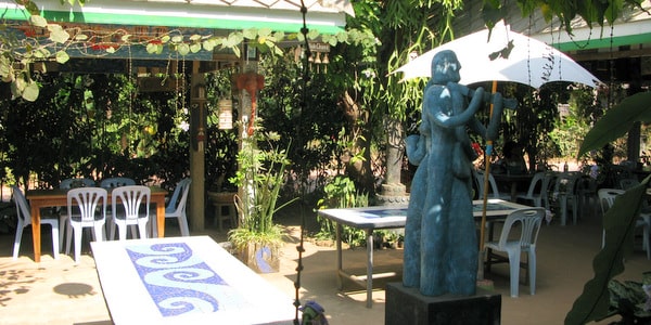 statue tables chair restaurant klong son bao koh chang
