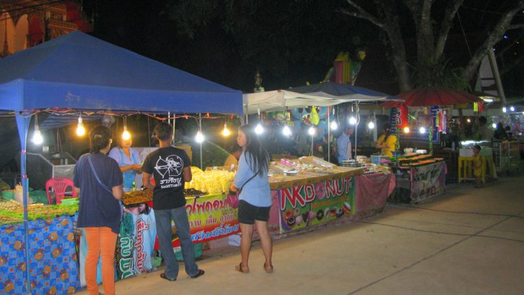 poeple stalls temple fair koh chang