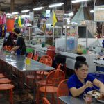 trat-indoor-market-customers-eating-lunch