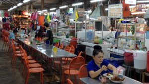 trat-indoor-market-customers-eating-lunch